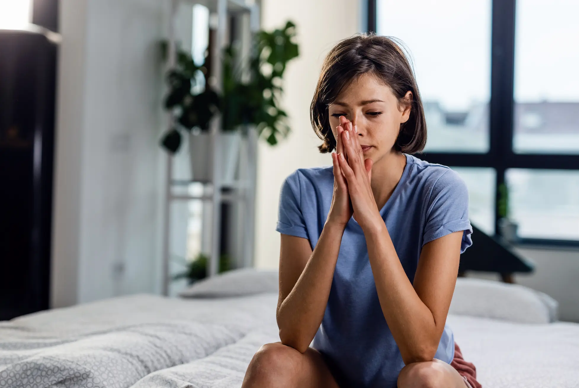 An anxious individual thinking of getting therapy for anxiety in Ontario.